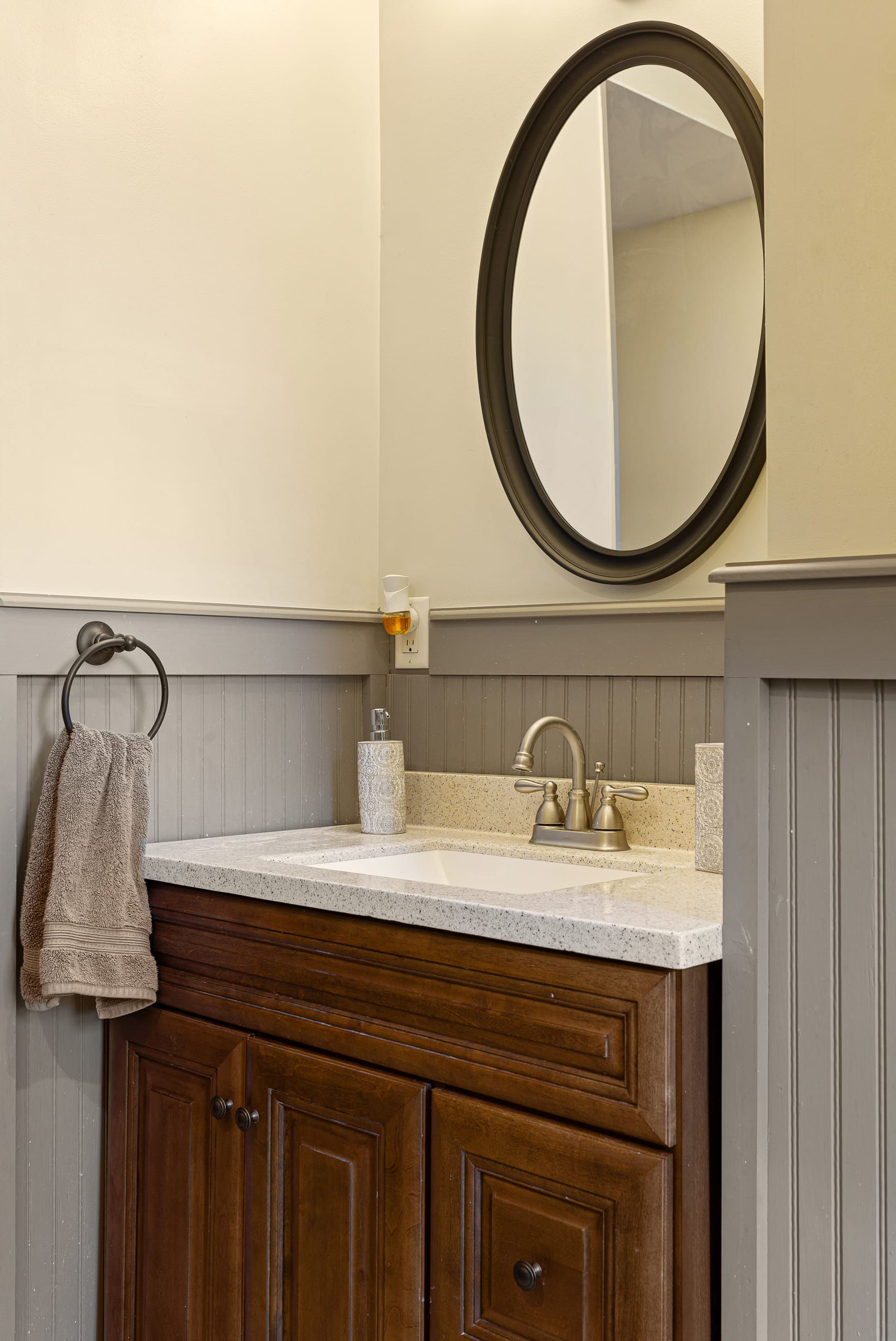 Cherry vanity with oval mirror