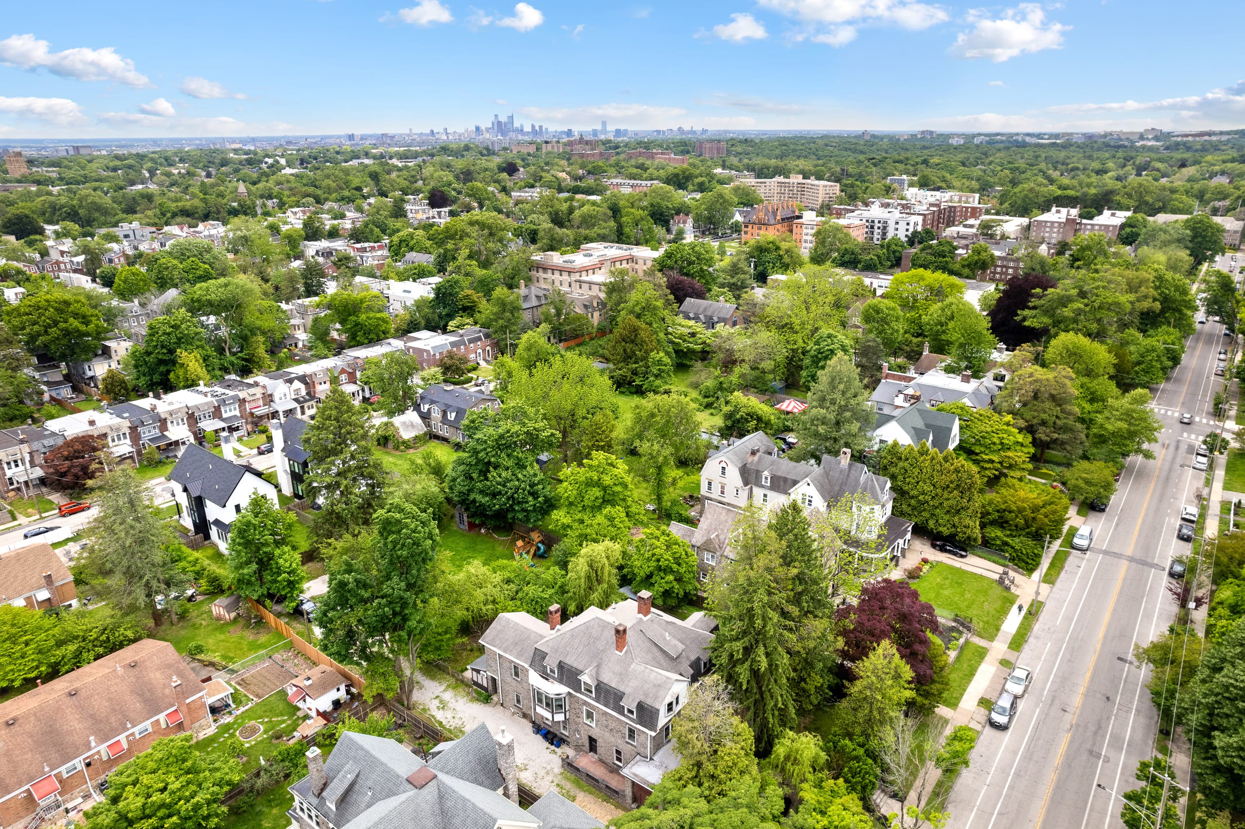Aerial view of West Mount Airy with the Center City skyline in the distance