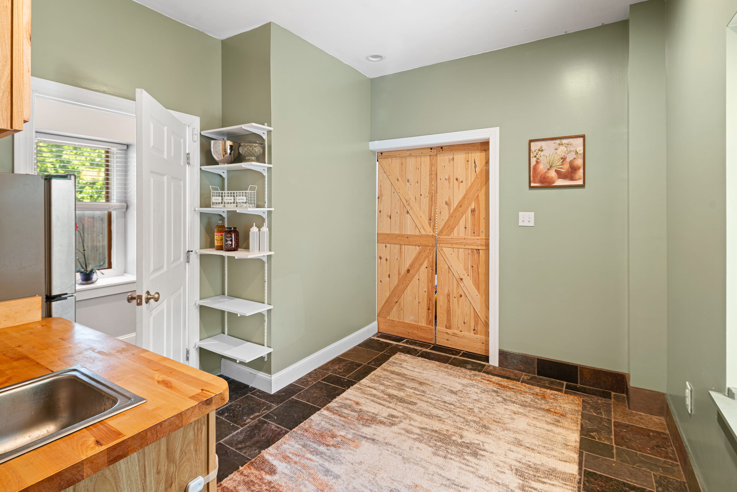 In-law suite with kitchenette and barn door